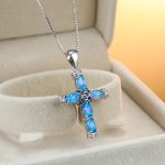 copper synthetic opal cross pendant