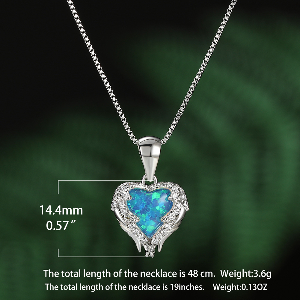 silver tone blue opal heart necklace